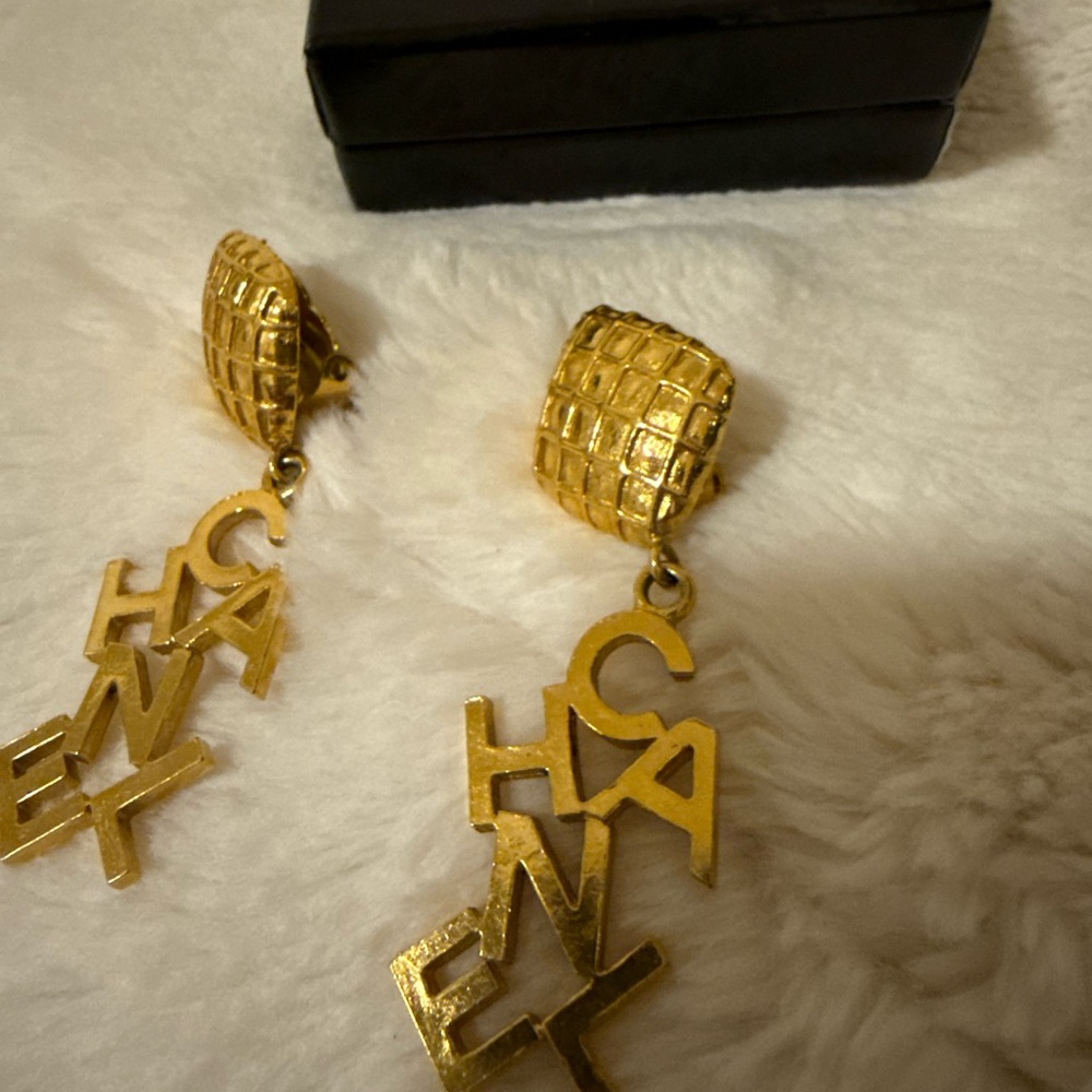 CHANEL Gold Ornate Earrings with Textured Dome and Artistic Design